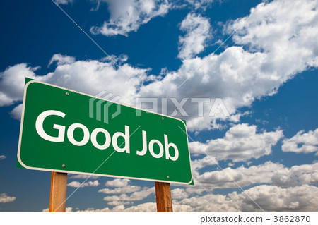 图库照片: good job green road sign with sky