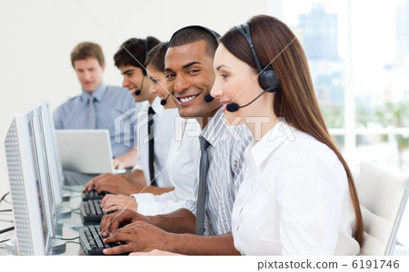 图库照片: international business people working in a call center