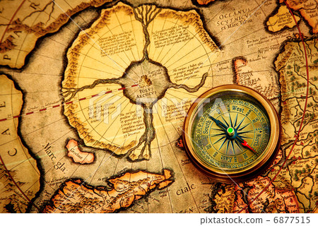 照片素材(图片): vintage compass lies on an ancient map of the