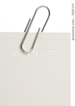 a piece of paper,skipping-rope 图库照片: paper clip on a piece of paper. close-up.