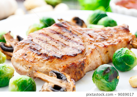 grilled pork chop with brussels sprouts