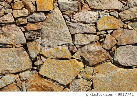 图库照片: background of stone wall texture