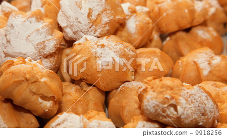 图库照片: profiteroles choux pastry buns with whipped cream