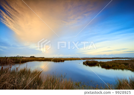 beautiful sky over lake before sunset