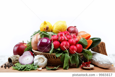 healthy food. fresh vegetables and fruits on a wooden board.