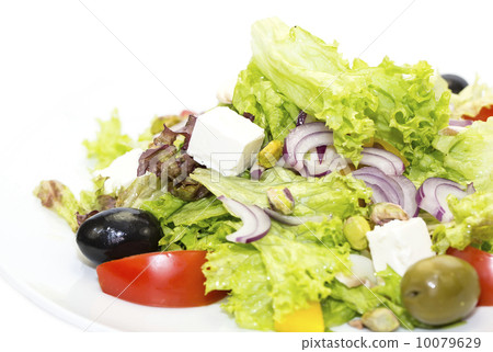 图库照片: greek salad on a white background in the restaurant