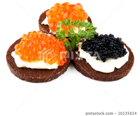 black bread with salmon, trout and sturgeon caviar