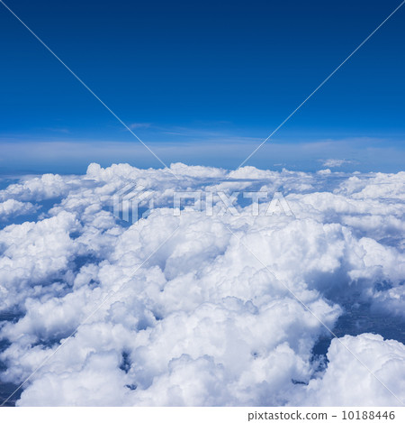 cloudy sky from a window of jet aircraft