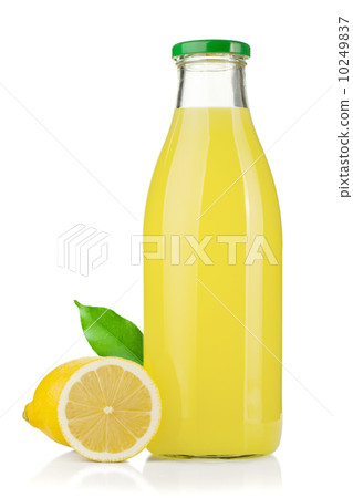 bottle of lemon juice and fresh lemons