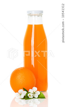 图库照片: orange juice in a bottle and orange isolated