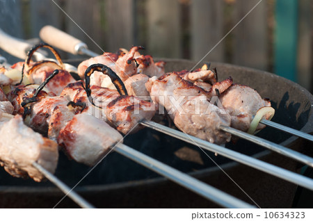 图库照片: shish kebab preparation on a brazier