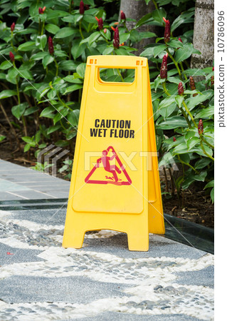 caution wet floor sign in the garden