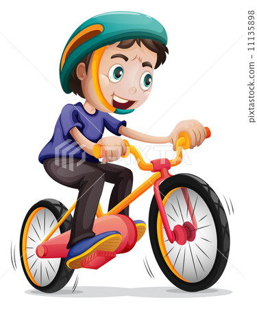 a young boy riding a bicycle