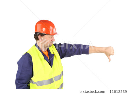 图库照片: worker in hard hat with hand thumb down.
