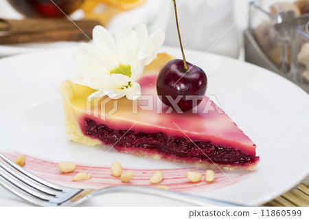 图库照片: piece of cherry pie on a table in a restaurant