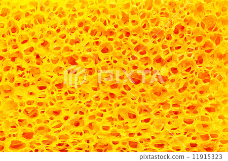 图库照片: yellow porous texture