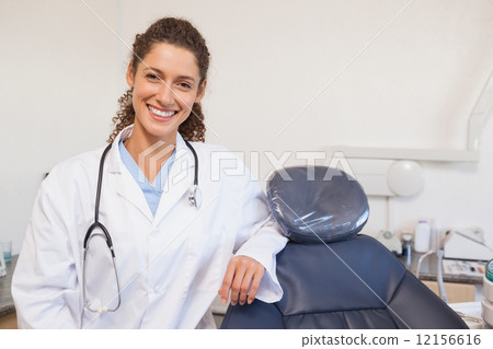 图库照片 confident dentist smiling at the camera