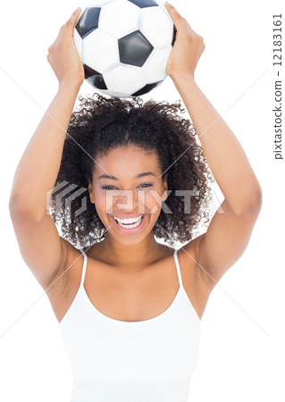 图库照片: pretty girl with afro hairstyle smiling at camera