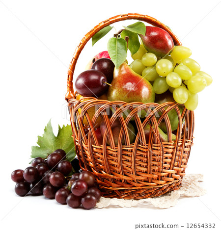 图库照片: fresh fruits in a basket. set of different.