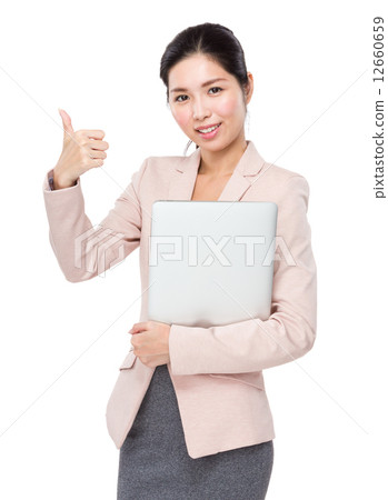 图库照片: asian businesswoman with laptop and thumb up