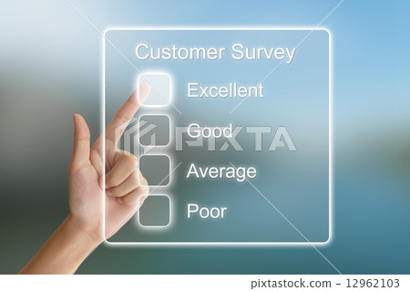 图库照片: hand pushing customer survey on virtual screen
