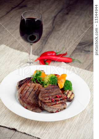 图库照片: delicious grilled beef steakes