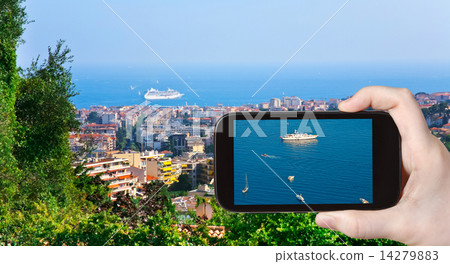 图库照片: tourist taking photo of ships near cannes