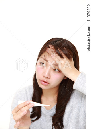 图库照片: 一个发烧的女人