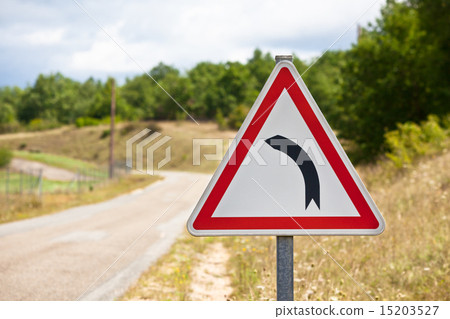 turning,corner 图库照片: traffic sign indicating road is turning left