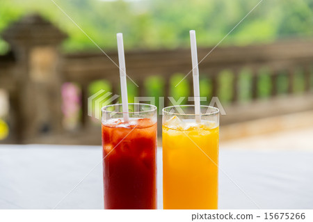 图库照片: glasses of fresh fruit juice at restaurant