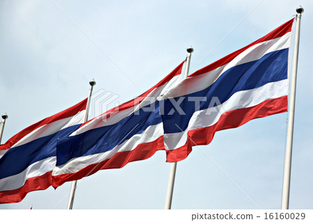 图库照片: flag of thailand hit by strong wind.