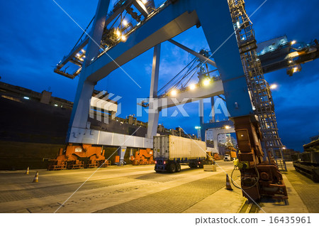 图库照片: container cargo operation in busy port terminal.