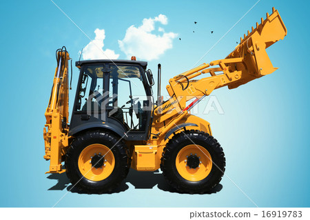 图库照片: yellow new tractor