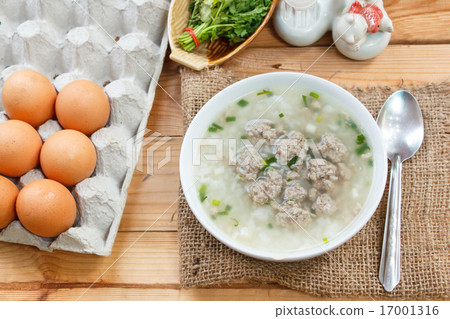 图库照片: rice porridge with minced pork.