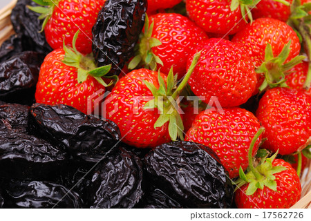 图库照片: background from strawberry and prune