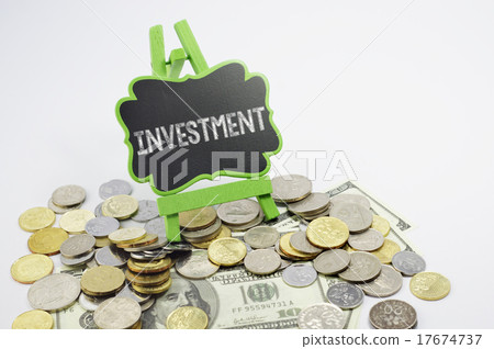 图库照片: investment text and money - business concept
