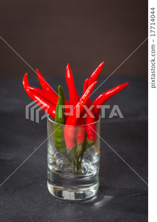 图库照片: red chile pepper in glass