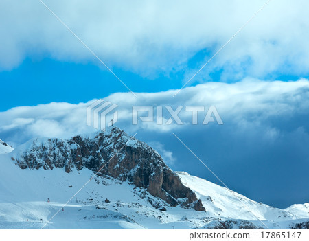 图库照片: winter mountain slope with ski track.