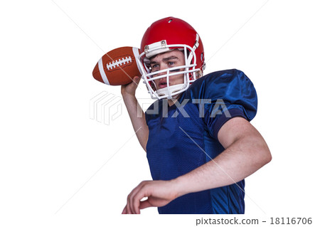 图库照片: american football player throwing the ball