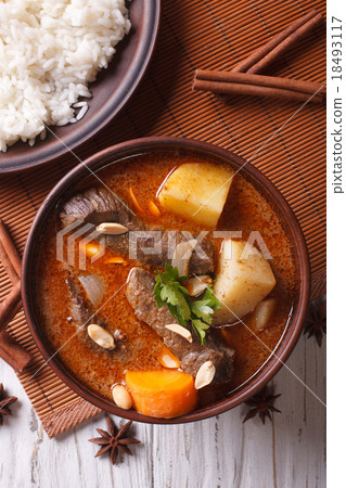 图库照片: beef massaman curry and rice side dish closeup