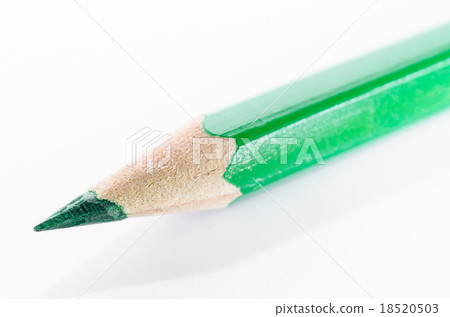 图库照片: green colouring crayon pencil.