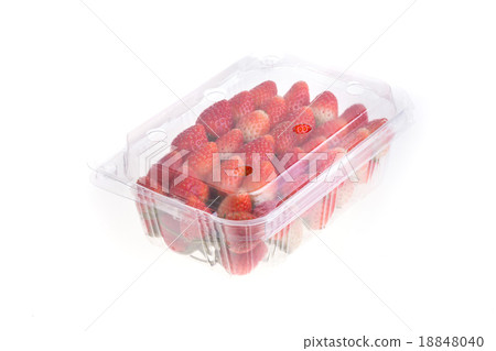 图库照片: red ripe strawberry in plastic box of packaging