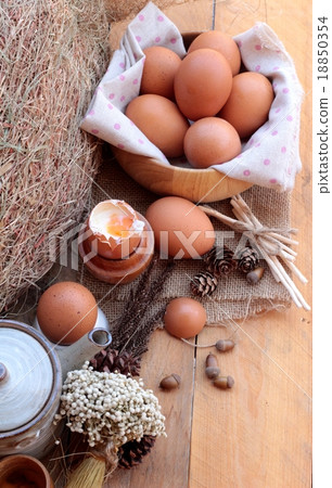 图库照片: soft-boiled egg and eggs on wood background