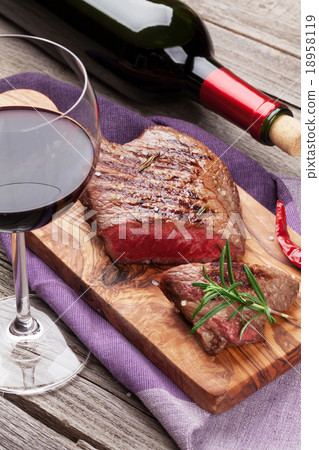 图库照片: grilled beef steak and red wine