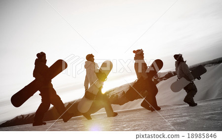 图库照片: people on their way to snow boarding concept