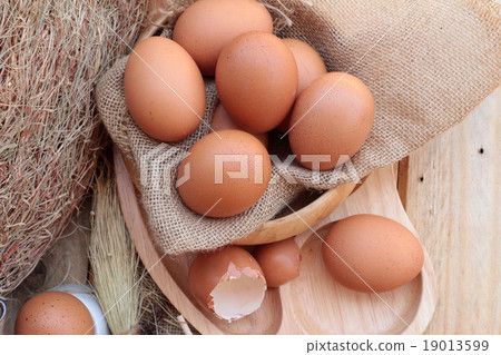 图库照片: soft-boiled egg and eggs on wood background