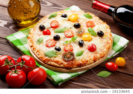图库照片: italian pizza and red wine