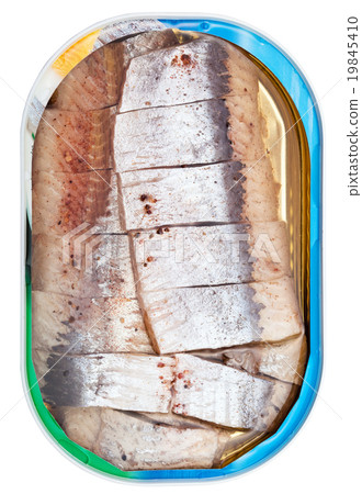 图库照片: tinned pickled herring in brine isolated