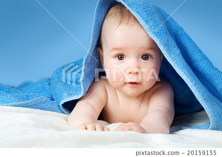 图库照片: cute baby in a towel