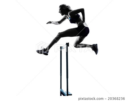 图库照片: woman hurdlers hurdling silhouette